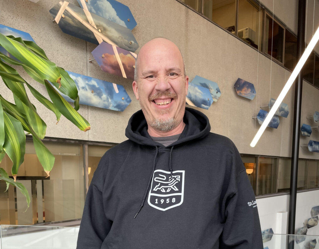 Charles in College Merch